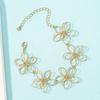 Retro Geometric Metal Flower Bracelet for Women - High-End Woven Jewelry