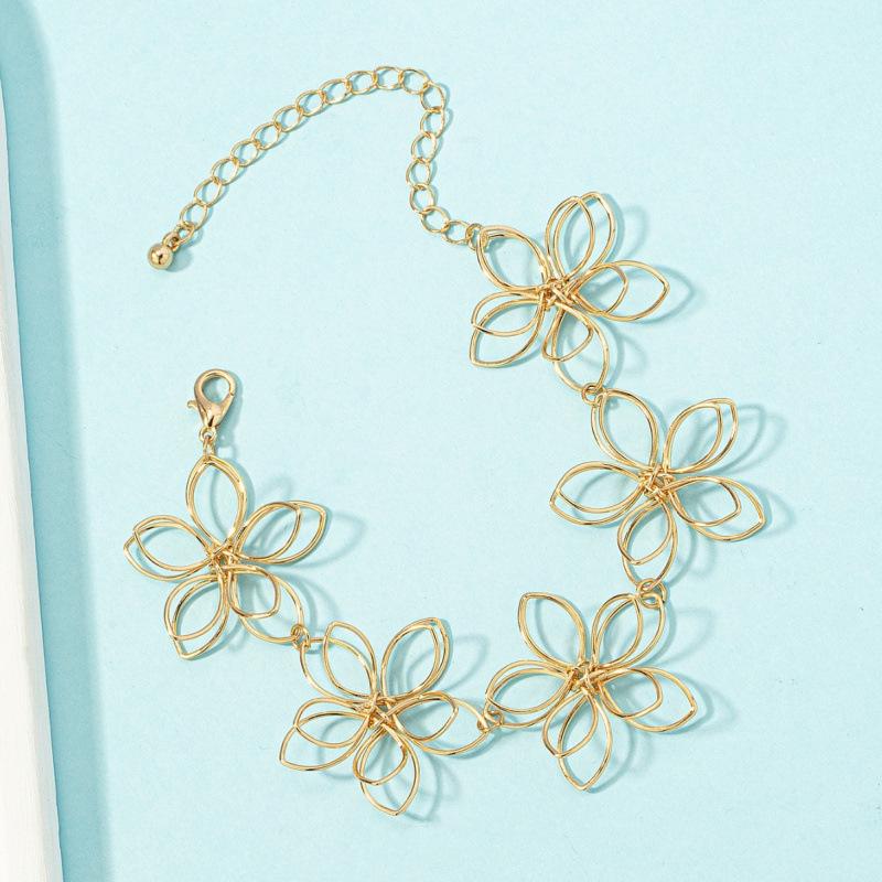 Retro Geometric Metal Flower Bracelet for Women - High-End Woven Jewelry