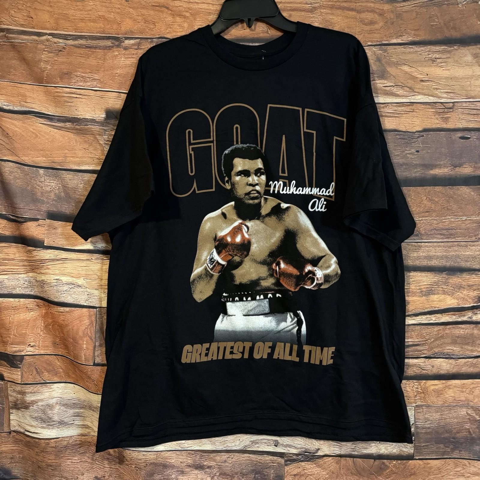 Muhammad Ali Men s 2X Black GOAT Float Like a Butterfly Sting Like a Bee Unisex T-Shirt S
