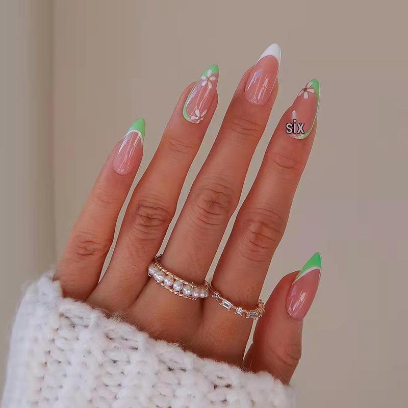 

Almond-Shaped Green French Nail Art with White Small Flower Stickers Glue Type