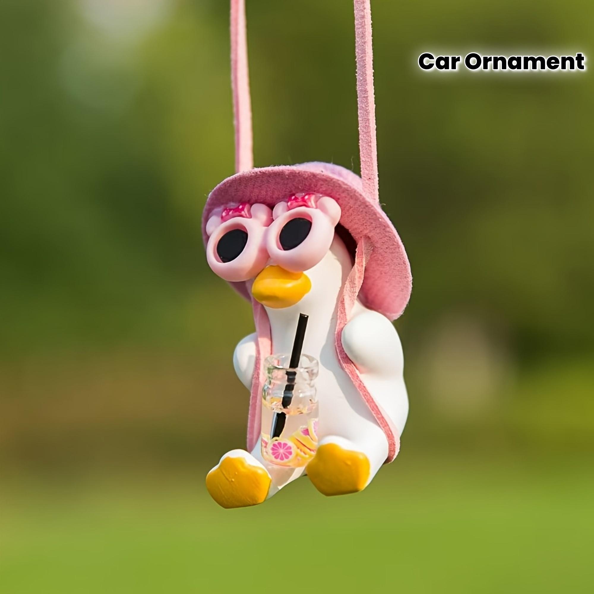 

A Cute Swinging Duck Car Ornament Designed for Automotive Decoration.