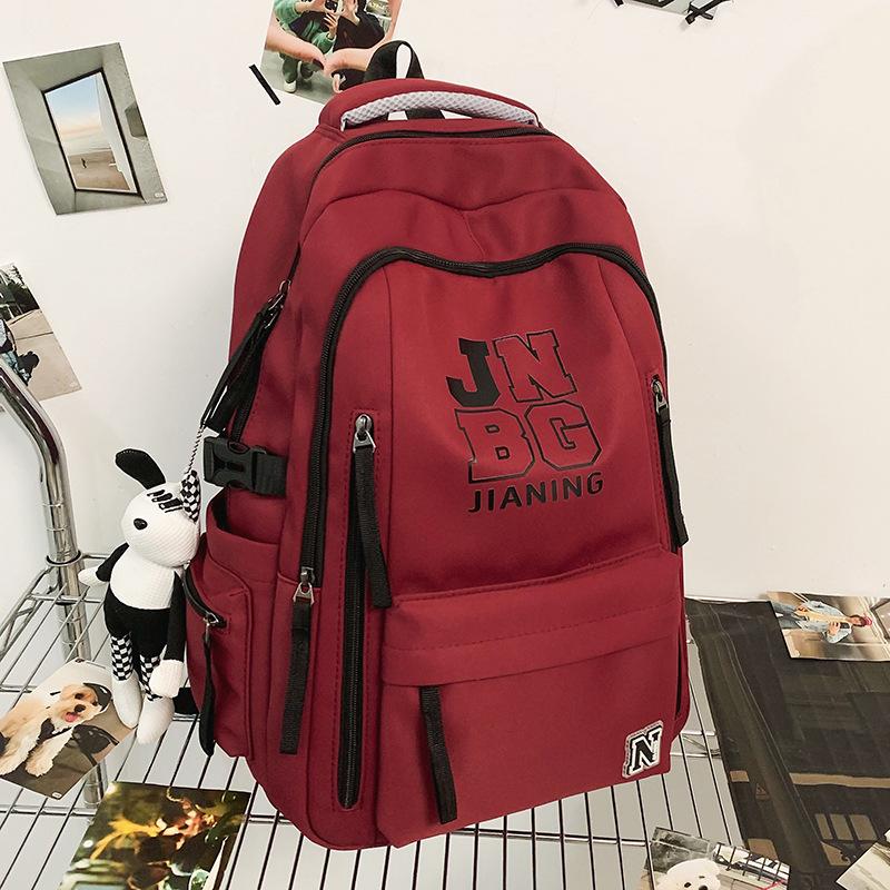 Children's Schoolbags Elementary School Students  Girls  Junior High School Students  Dirty Resistant Men's Large Capacity Letter Backpack