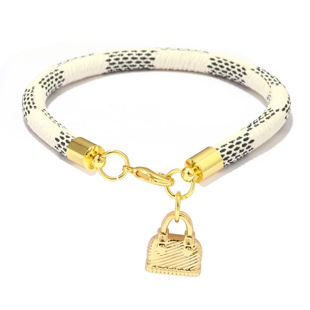 High-End Fashion Stripe Leather Bracelet with Gold-Plated Metal Accents