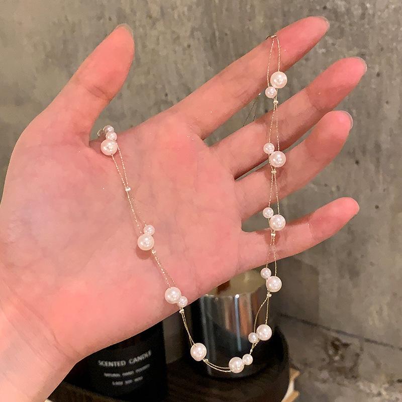 

Двухслойное ожерелье из неправильного жемчуга, ретро темперамент, цепочка на ключицу, нишевая высококачественная бижутерия для женщин
