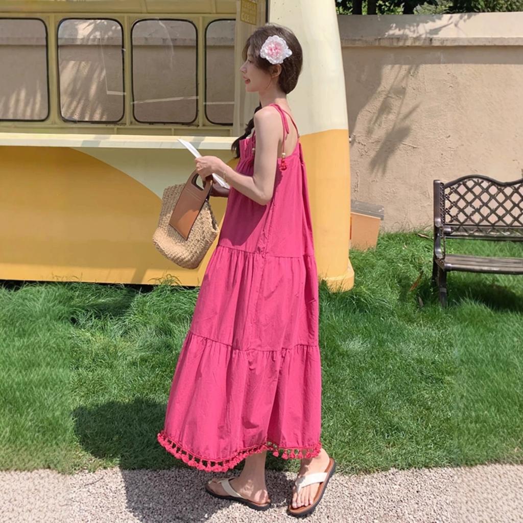 Summer 2026 new women's clothing vacation dragon fruit color fringed strap dress temperament pendulum long skirt