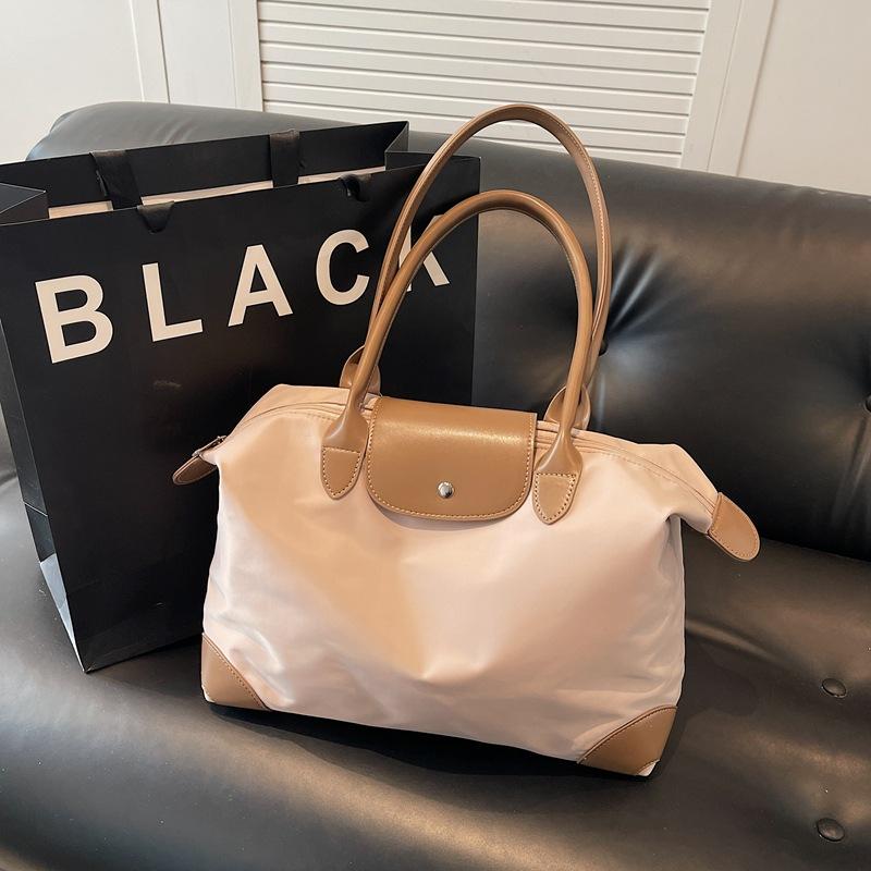 Travel bag, high-end sense, large-capacity anti-splashing dumpling bag, fitness bag, business trip, maternity, accommodation, storage, shoulder bag.