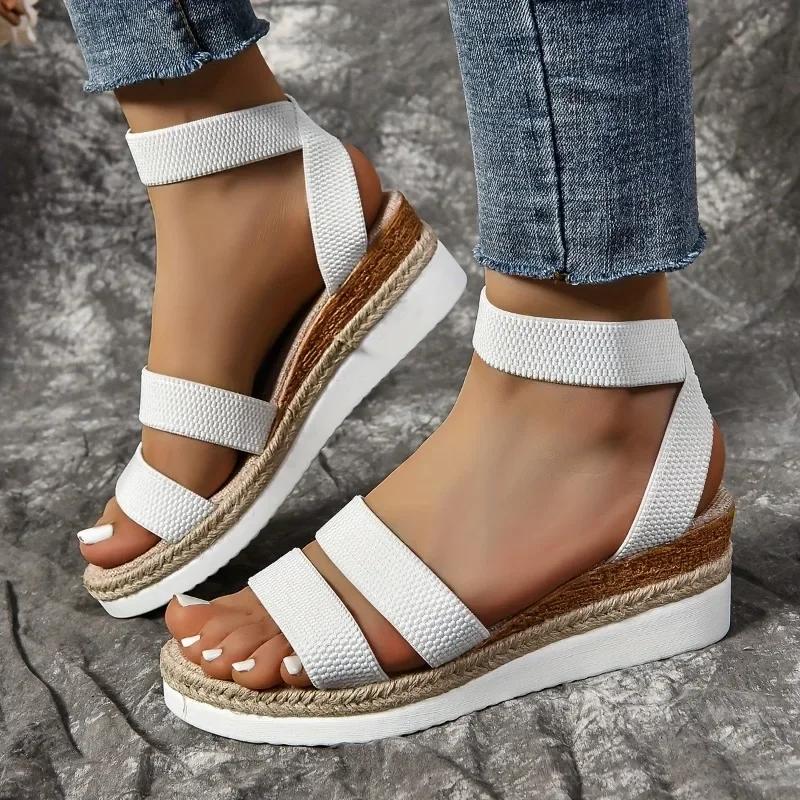 

2024 Женская обувь Женские сандалии с эластичным ремешком Летние римские с открытым носком Однотонные повседневные пляжные босоножки на танкетке большого размера 43