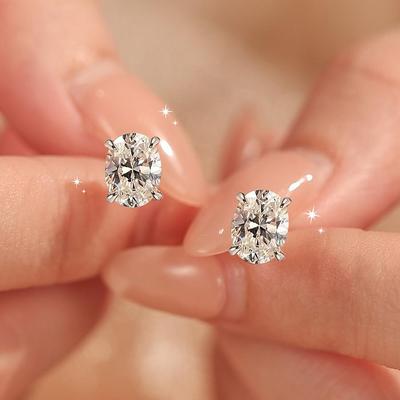 Boucles d'oreilles puces ovales haut de gamme européennes et américaines en argent sterling avec moissanite œuf de pigeon pour femmes