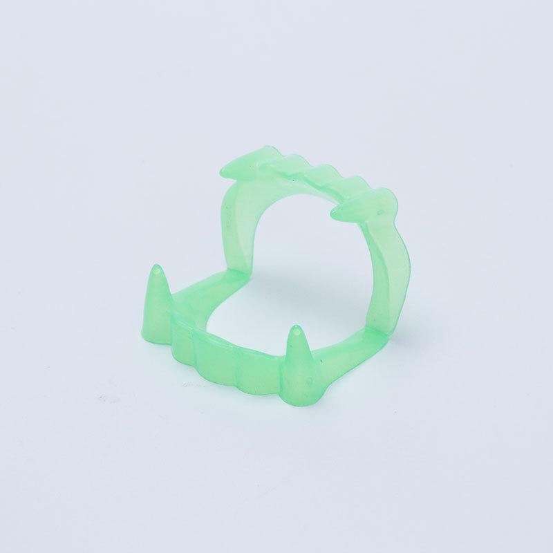 

Glow-in-the-Dark Zombie Fang Dentures & Claw Nails - Halloween & Prank Toys
