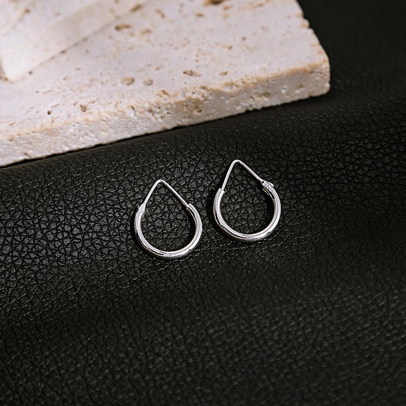 

Korean Retro Round Bead Earrings with Spring Knot Design