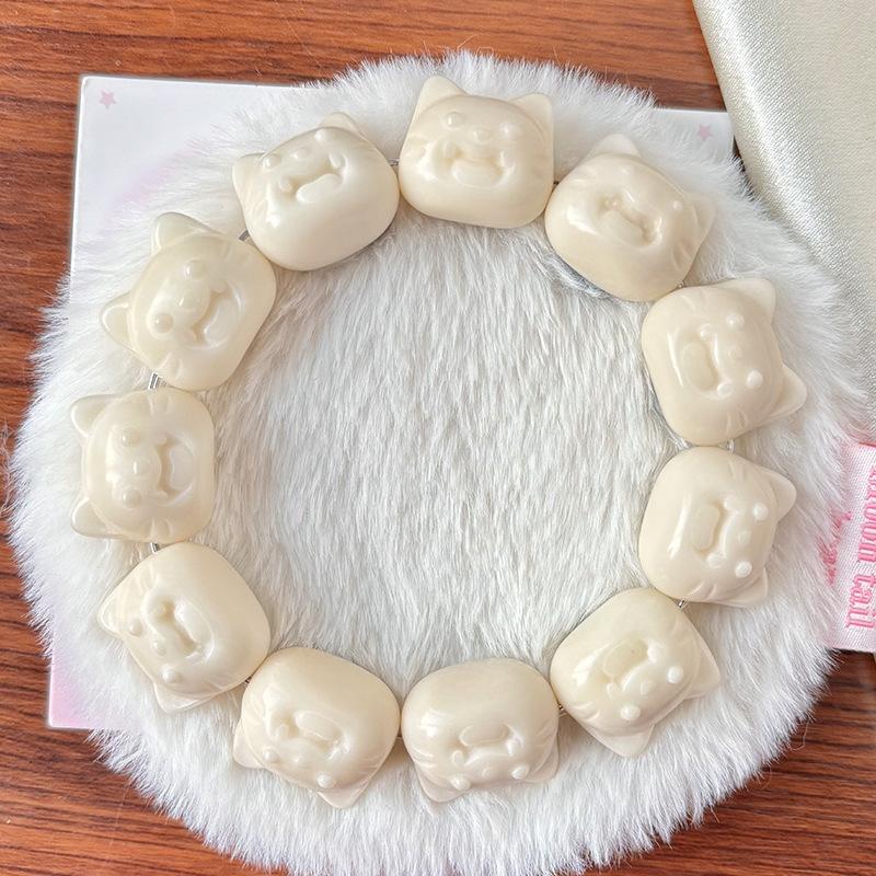 

Little Red Potato-style ivory fruit carving hand-twisted bracelet, charcoal-grilled peach star stress-relief fidget toy Yamao【Ivory white tooth