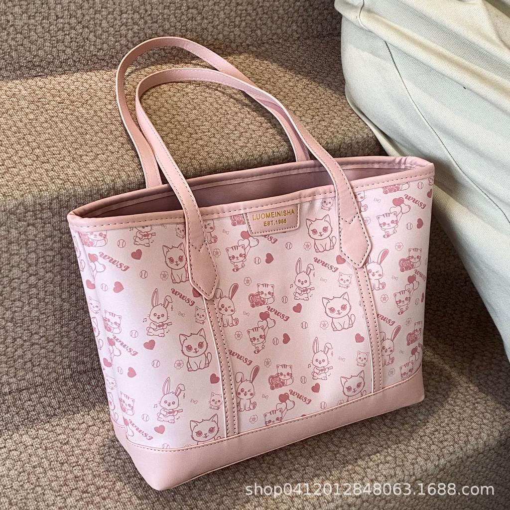 Simple temperament large capacity tote bag women's 2025 spring and summer new small fresh printing shoulder commuter armpit bag