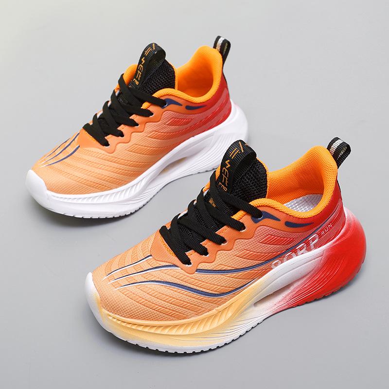 2025 spring and summer new children's sports shoes mesh breathable lightweight shock absorption middle and older children's shoes primary school stud