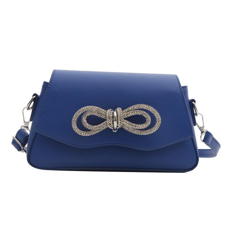 

Bow women s bag 2024 spring new fashionable foreign texture simple casual trendy shoulder messenger bag синій