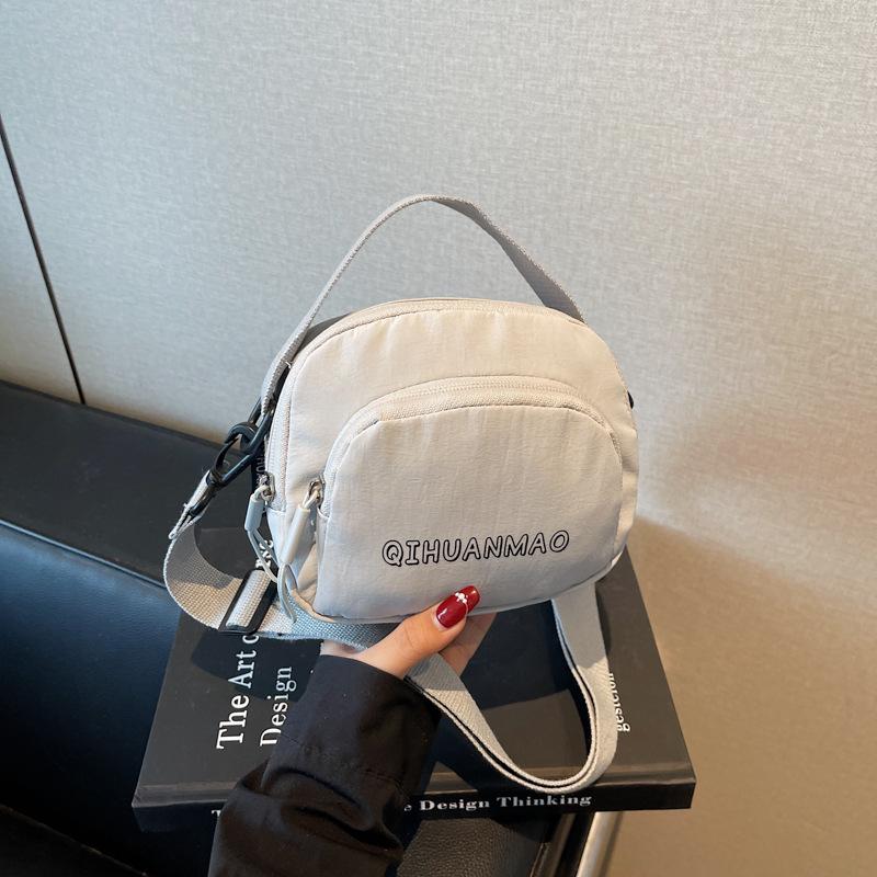 

Internet celebrity texture small bag women s bag new 2025 summer foreign style canvas bag women s mini versatile shoulder crossbody bag серый