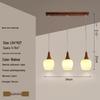 Modern Solid Wood Pendant Lamp with Three Heads, Walnut Finish, Japanese Style for Dining Rooms and Bars.