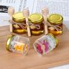 1.5 Oz Hexagon Mini Glass Honey Jars Honey Jars with Wood Dipper, Gold Lid, Bee Pendants, Jutes - for Baby Shower, Wedding