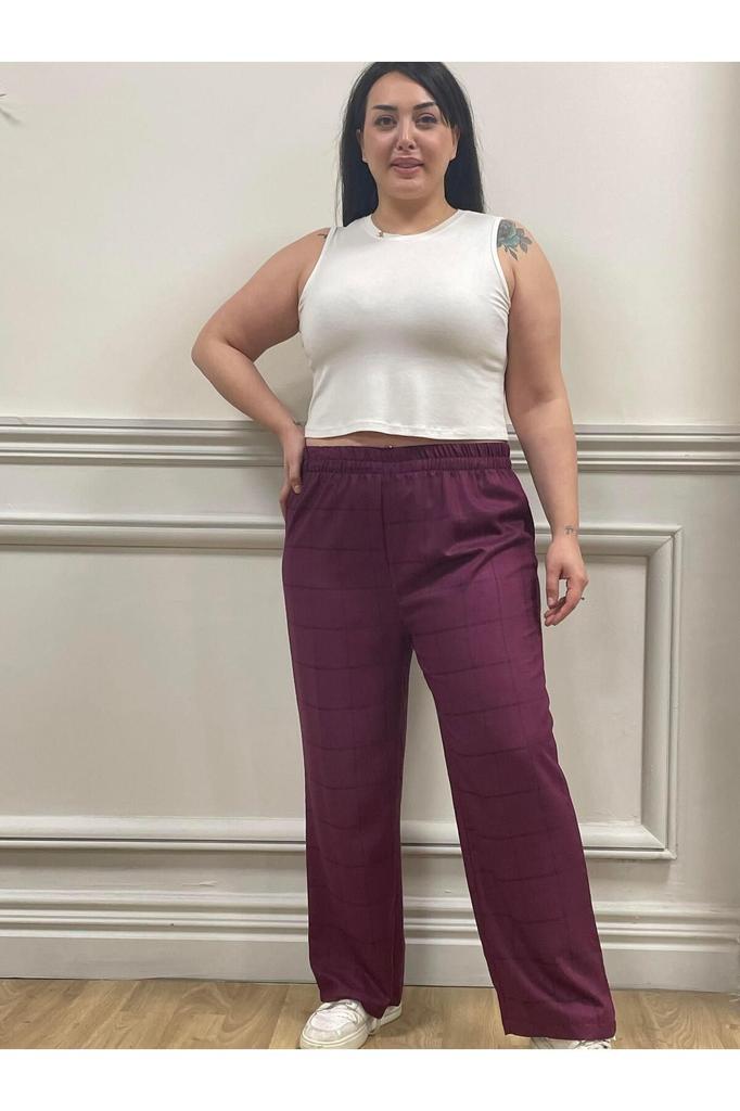 Spodnie damskie w dużych rozmiarach. Duże, bordowe spodnie w kratę z elastyczną talią