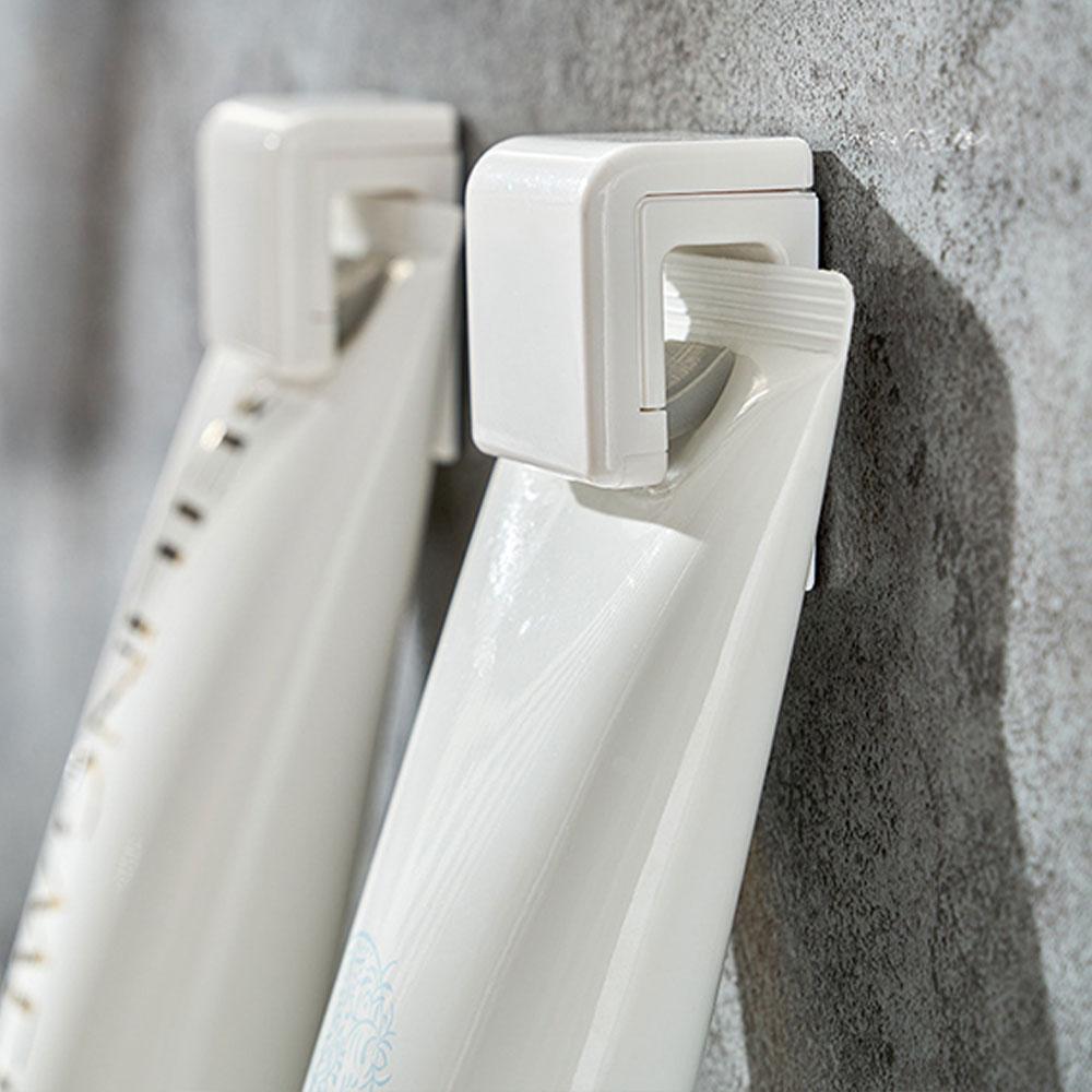 Traceless Plastic Clip for Toothpaste Self Adhesive Hanging Toothpaste Stand Dispenser for Bathroom Use
