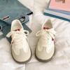 Sweet Korean little white shoes women's 2025 spring and summer new versatile niche design lightweight student explosion German training board shoes