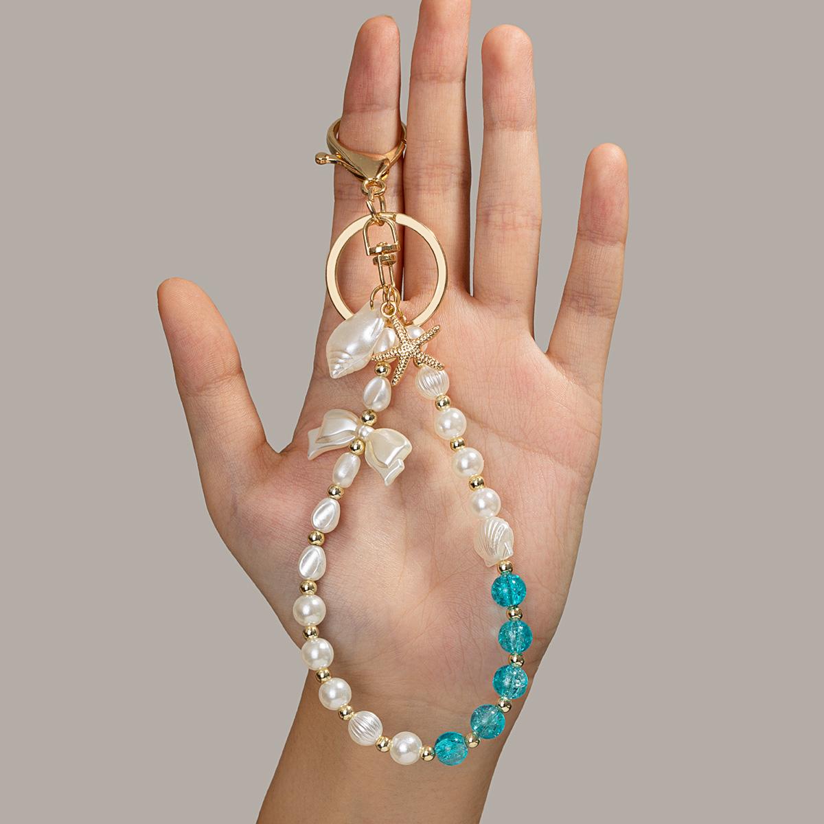 

Fresh Ocean Style Imitation Pearl Beaded Keychain, Mint Green Cracked Quartz Conch Starfish Bow Wristlet Keychain for