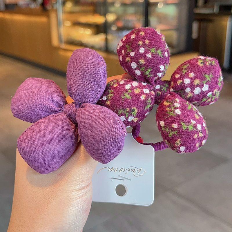 

2025 Spring Girls 4-Leaf Padded Flower Hair Ties Soft Fabric Elastic Bands Elegant Stylish High Bun Hair Accessories Must-Have