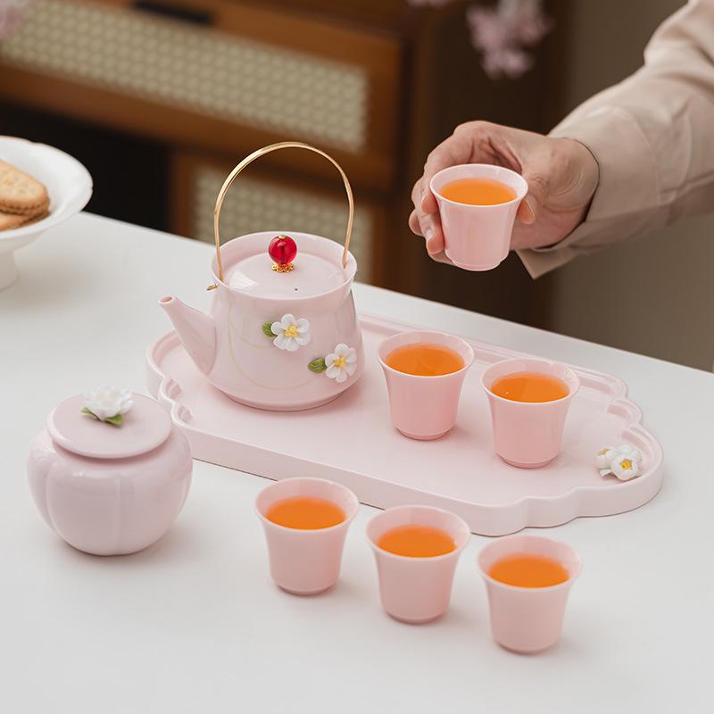 Women's Pink Ceramic Gongfu Tea Set with Teacup, Saucer, and Floral Handle Pot