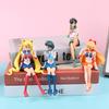 12CM Anime Sailor Moon Action Figure Beautiful Girl Water Ice Moon Pluto Yellow Hair Kawaii Sitting Collectible Model Toy