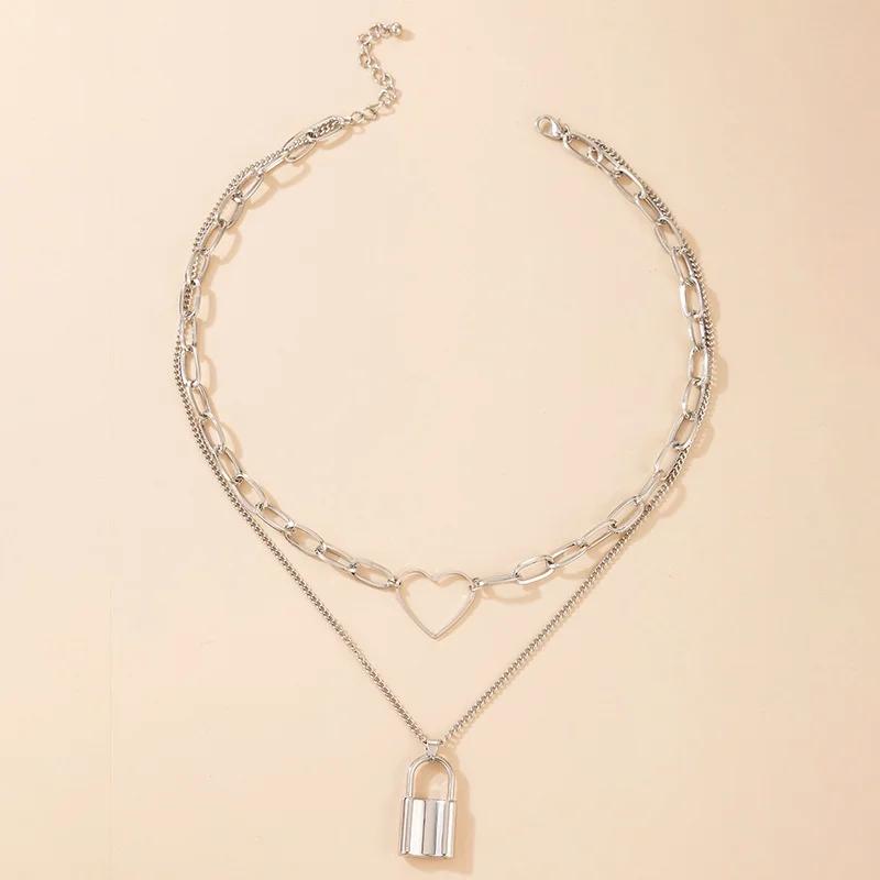 

Модные ювелирные изделия Подарочная цепочка Сердце Модный замок Кулон Ожерелье для женщин Полый Многослойный Геометрический свитер Аксессуары Подарки серебряный