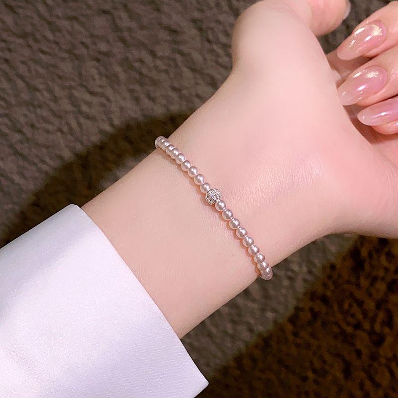

Изысканный браслет из нити розового жемчуга Manta для женщин 2025 Новое поступление Легкая роскошь Меньшинство Изысканные украшения для рук для подруг Pearl Beaded Bracelet