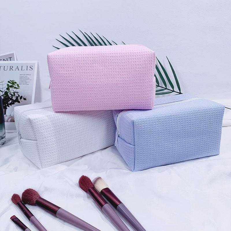 Trending Waffle Cosmetic Bag: Solid Color, Spacious, Women's Handheld Toiletry Organizer