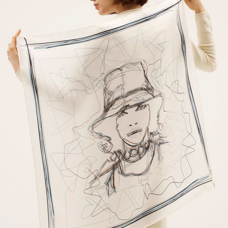 Woman wearing ONSZ hat and silk scarf
