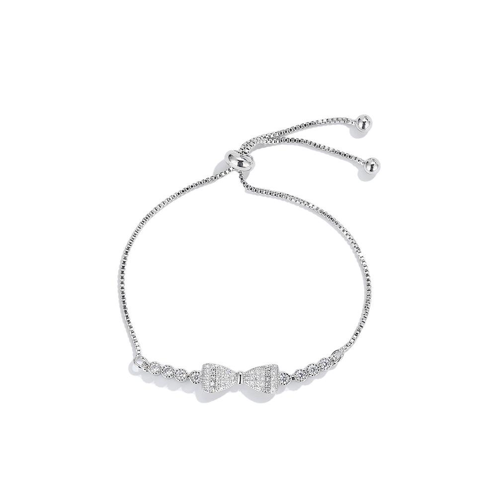 

Seiko micro-studded diamond bow bracelet pull-up jewelry платиновий
