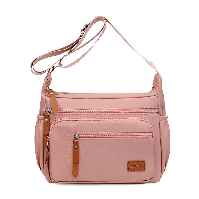 

Корейская версия модной водонепроницаемой сумки через плечо из ткани Оксфорд, новая женская повседневная сумка через плечо, сумка большой вместимости, холщовая сумка 26x31x10cm