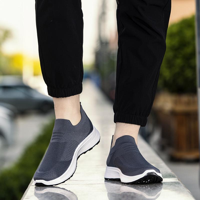 Men's shoes one-pedal lazy flying woven shoes foreign trade mesh sports shoes breathable and lightweight running shoes soft-soled casual men's shoes