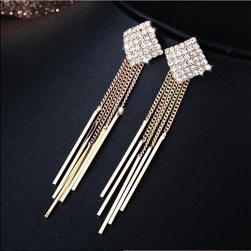 High-End Heart Tassel Earrings: Slimming, Long Dangle for Round Faces - Luxurious and Niche Design