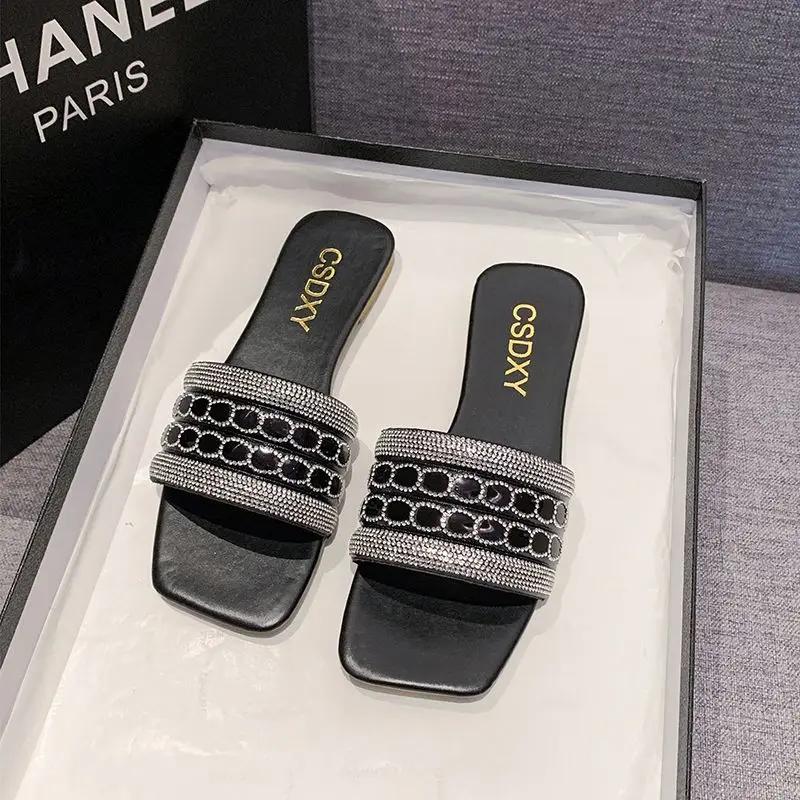 

Fashion Rhinestone Flat Slides Cheap Liquidation Clappers Women s Slippers and Ladies Sandals Comfortable Elegan Summer 2025 Pvc Shoes 35