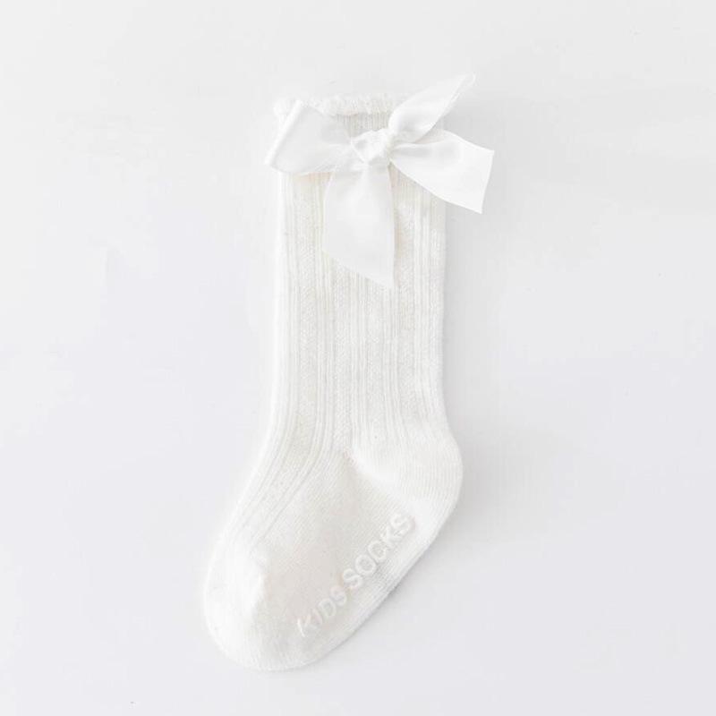 Chaussettes hautes en coton antidérapant pour nouveau-né avec nœud et rayures