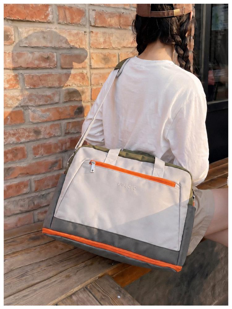 Large Capacity Casual Travel Bag: New Style Lightweight Handheld & Shoulder Luggage Storage for Couples