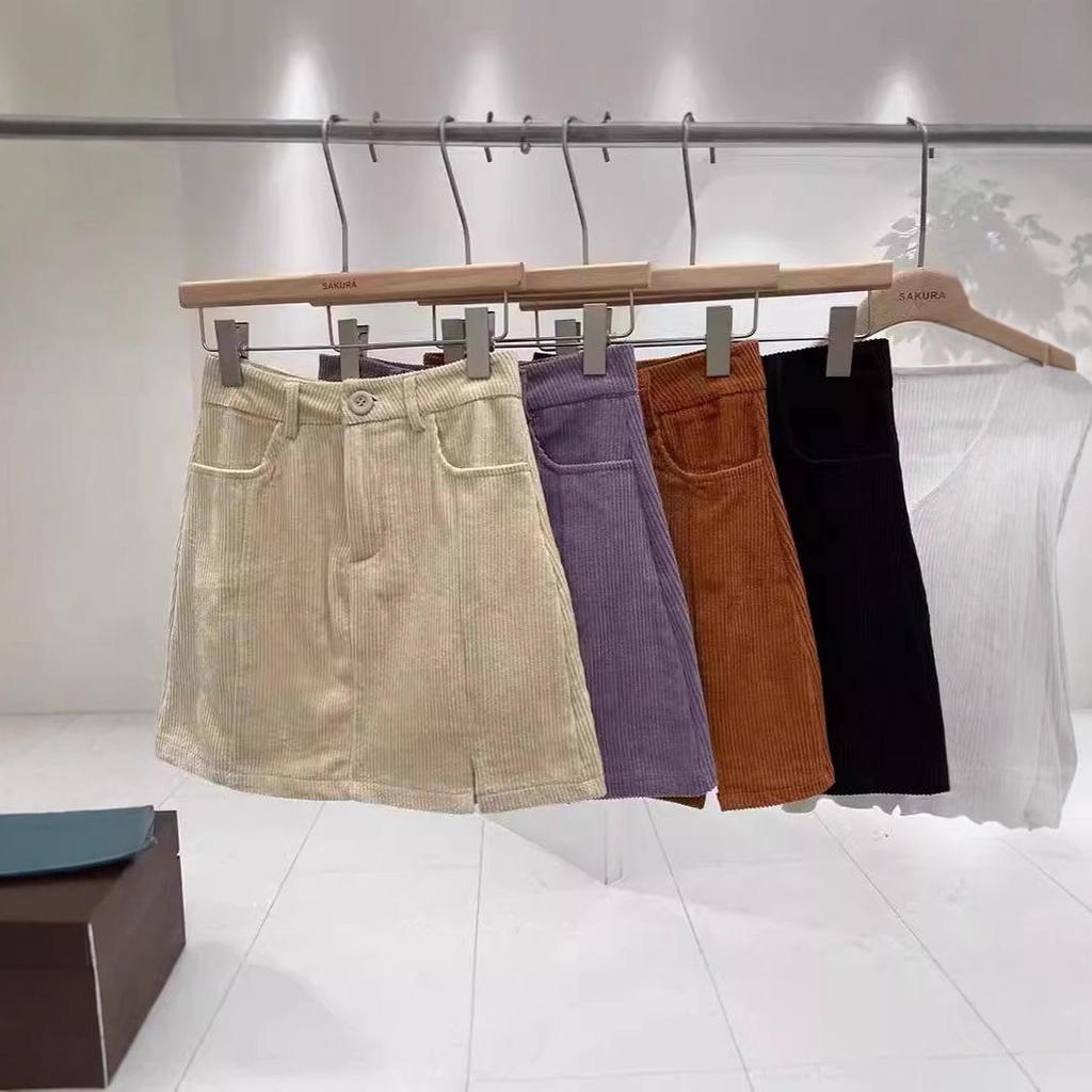 2024 Autumn Women's High-Waisted Corduroy A-Line Mini Skirt with Button, Slit, and Anti-Exposure Design - Korean Style Versatile Bodycon.