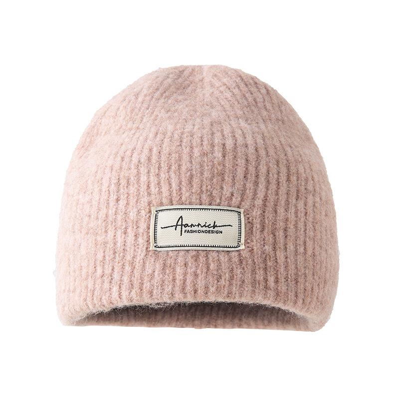 Simple cloth label wool wool hat women's autumn and winter comfortable cold hat outdoor cycling ear hat fashionable versatile knitted hat