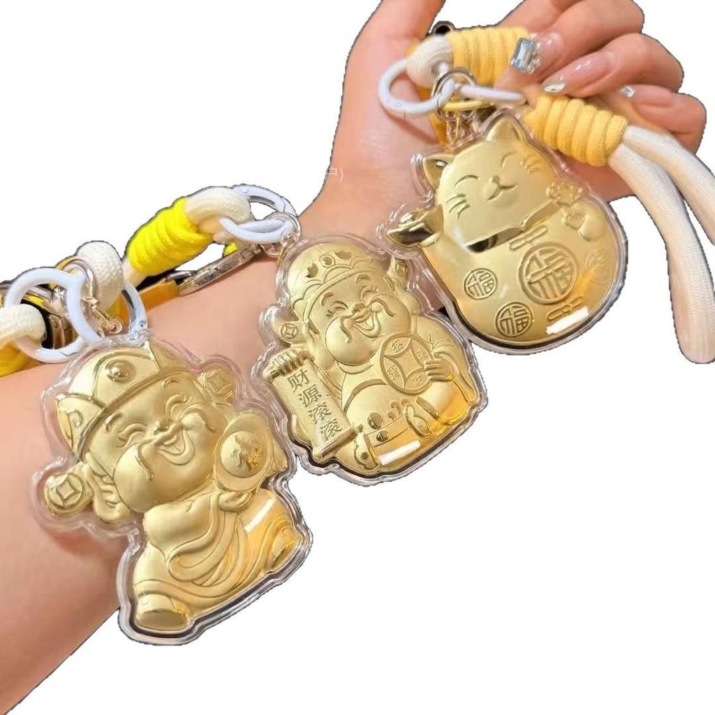 Stated Simply, "Hello Kitty Gold Ingot Lucky Cat Keychain Charm."