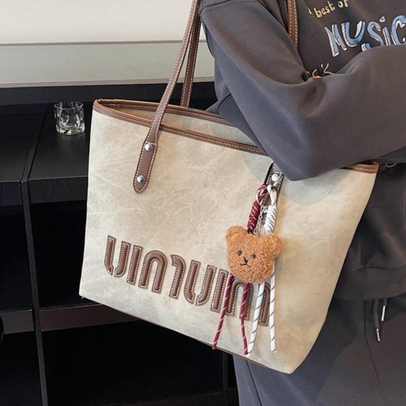 Fashion large-capacity tote bag women's new casual commuter shoulder bag retro niche design armpit bag