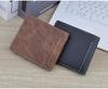 Men's Vintage Short Zipper Leather Wallet: High-End Spliced Embossed Multi-Functional Card Holder.