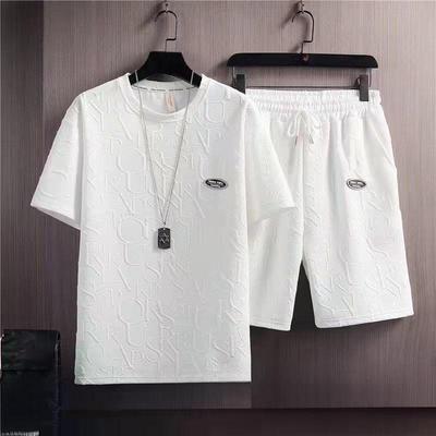 Abito estivo da uomo in stile coreano: Completo casual alla moda con t-shirt e pantaloncini a nido d'ape in tinta unita