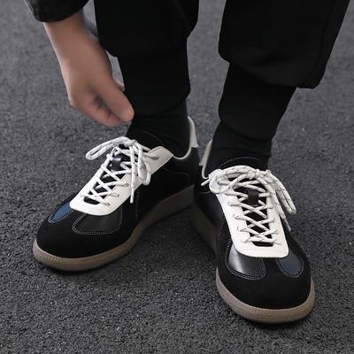 Nueva tendencia de cuero de primavera zapatos casuales deportivos de tacón plano de nicho zapatos de tabla versátiles retro para hombre