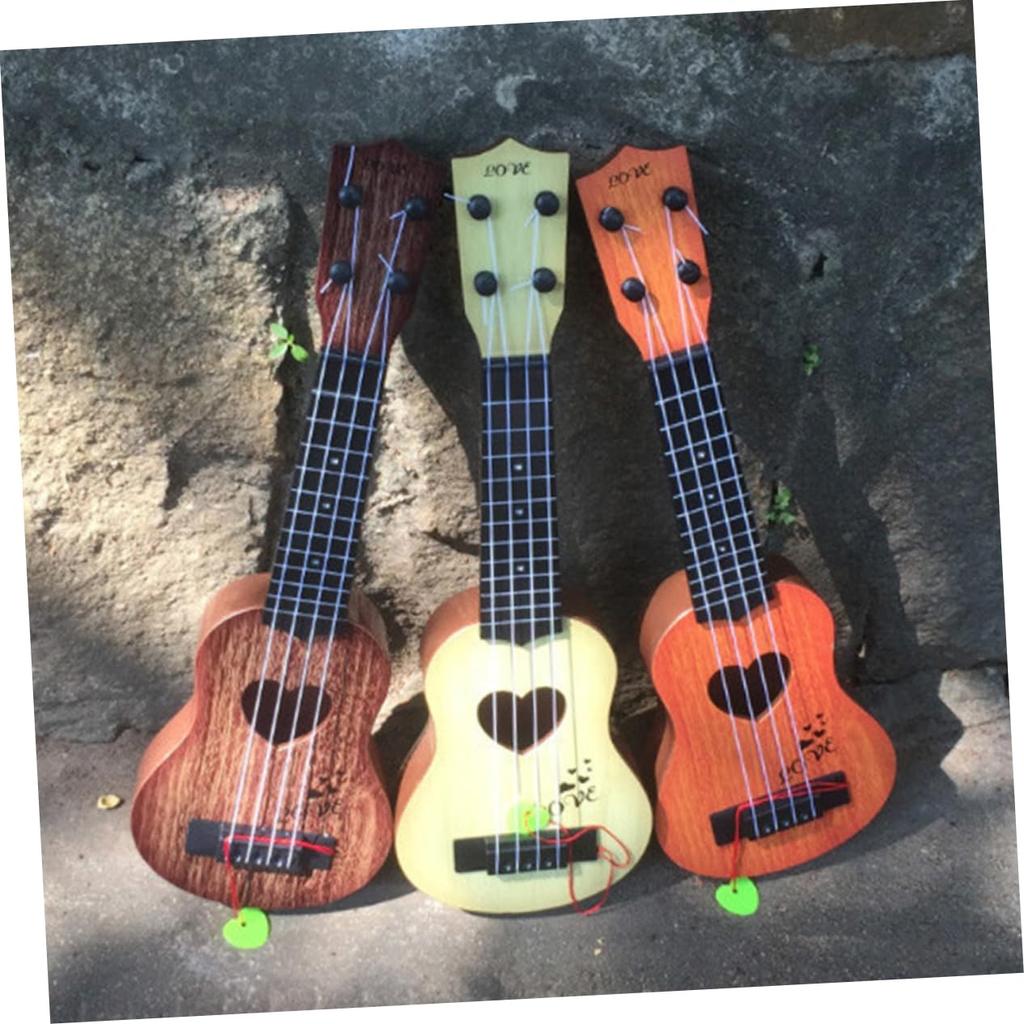 SEWACC Ukulele Plastic Mini Ukulele Mini Guitar for Children Acoustic Guitar 4 String Guitar Beginner Guitar Children Musical Instrument Play Easy To
