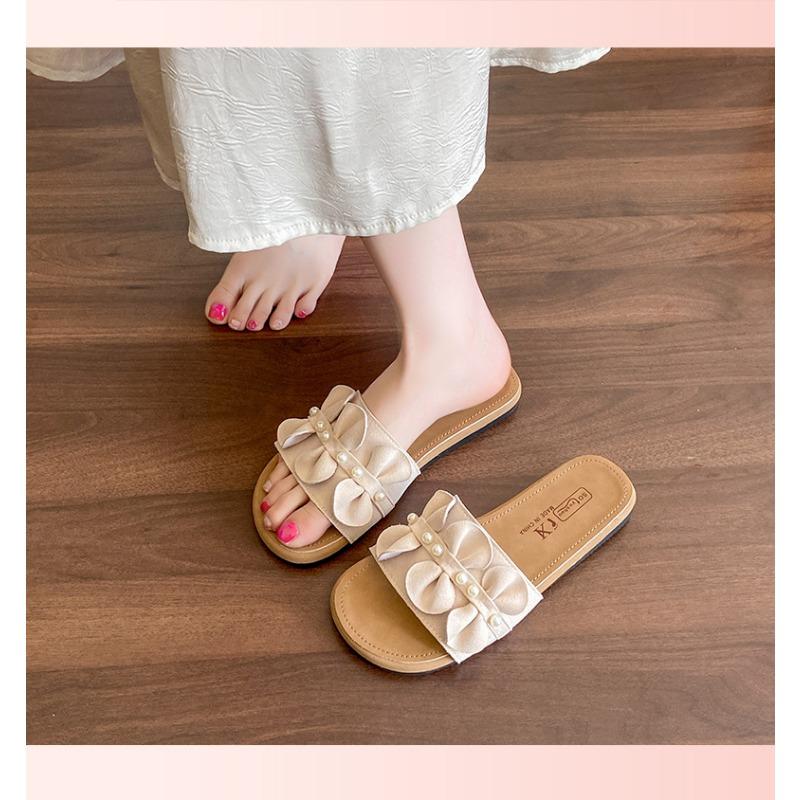 

Flat-bottomed one-word drag shoes for women s summer wear, new with skirt, soft-soled casual beach sandals 40