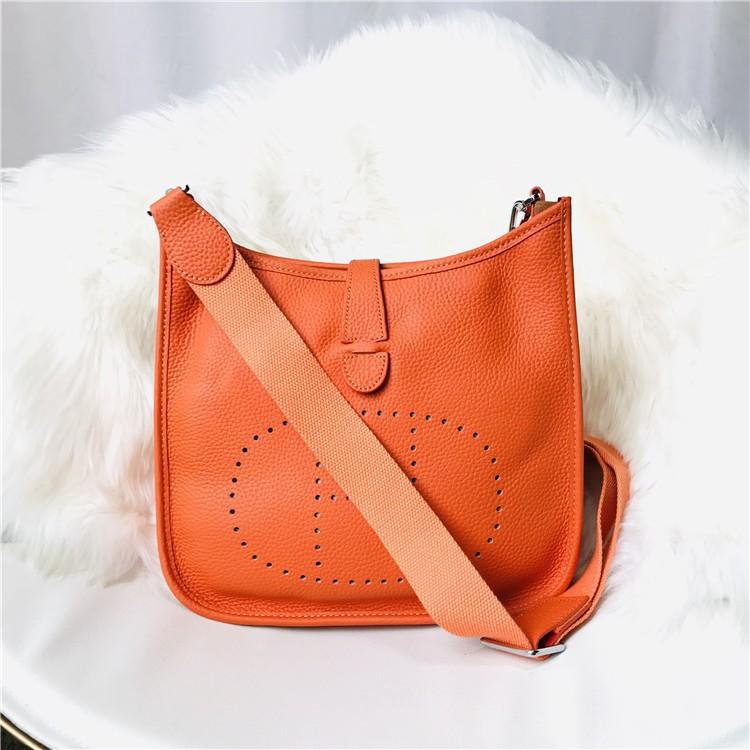 Lainey bag Nieuwe mode toplaag koeienhuid geperforeerd mode casual dames tas schoudertas crossbody dames tas Mini 17cm oranje