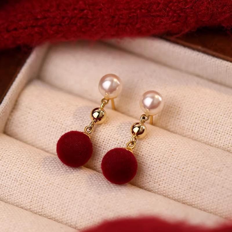 Retro temperament autumn and winter red pom-pom pearl stud earrings women's light luxury high-end temperament natal year earrings New Year
